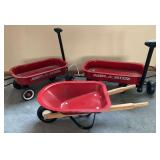 Two Radio Flyer miniature wagons and a Radio Flyer miniature wheelbarrow