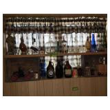 Beverage collectibles includes decanters, growlers, glasses and two wooden boxes