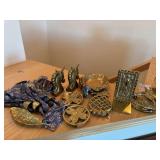 Brass items, trivets, horse, bookends, horse, door, knocker, napkin, rings, and more – bring box to pack