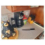 Coffee pot, knife block, bear cookie jar, can opener, swivel tray.