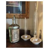 Antiqued glass bottle and two oil candles