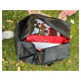 Large storage bag full of holiday wrapping goodies