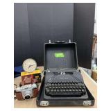 Smith Corona manual typewriter, BigBen alarm clock and Kodak pony camera