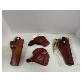 Four leather holsters-Smith & Wesson 21 05, Hunter 4500-6, Old World 23567 and Old World 23439