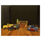 Box of assorted die cast truck/car banks