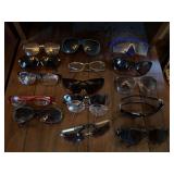 15 pair of sunglasses, reading glasses and cases