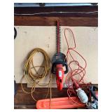 Toro leaf blower, hedge trimmers, and multiple extension cords