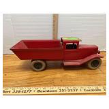 Early Wyandotte pressed tin dump truck w/ hard rubber tires