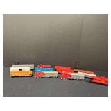 Various HO scale cars and two engines