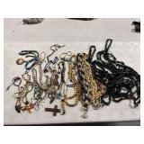 Various jewelry ncludes glass beads, beadwork, etc