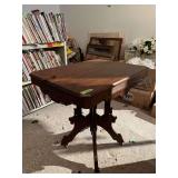 22 x 30 walnut parlor table w/ porcelain casters