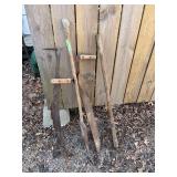 2 hay knives, fence stretcher, and root axe