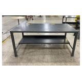 Metal work table. 72in long x 34in t x 36in deep