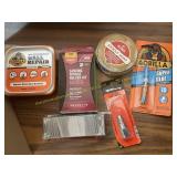 Assorted sand paper, glue, staples etc