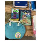 Bigfoot notebook, teal lunch bag, rain maker toy