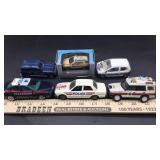 6 police cars including boxed Waldmeiwe Swiss