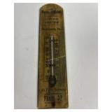 Vintage wooden advertising thermometer