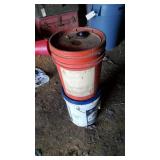 2 Partial Buckets of Hydraulic Fluid