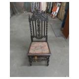 Wooden Chair With Decorative Carvings