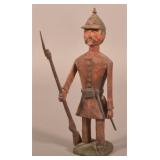 Contemporary Folk Art Carved Hessian Soldier.