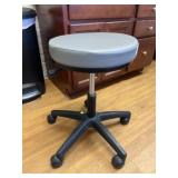 Vinyl Upholstered Adjustable Stool on Rollers