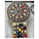 Dartboard and pool balls