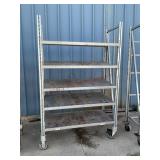 Metal shelving unit on wheels, 24" x 55" x 86"