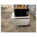 Formica dropleaf table and JC Penney microwave.