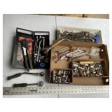 3/8" ratchet and assorted sockets and tools