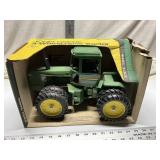 John Deere 4-wheel-drive tractor