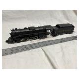 Lionel O gauge steam engine with coal car,