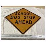 School Bus Stop Ahead road sign