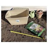 30 gallon tote with potting mix plastic pots etc.