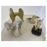 Pile of Angel Figurines & Candle Stick