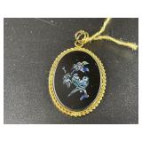 Necklace pendant with gold tone frame, with beauti