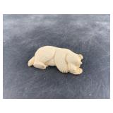 Stunning mammoth ivory carving of a hibernating be