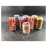 Large lot full of variety and vintage Coke cans al