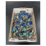 Box lot of color coded costume jewelry