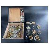 Tobacco box full of stunning costume brooches most