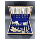 Partial silver-plated flatware set and several hea