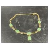 14kt Gold, jade necklace 30 grams total weight, in