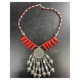 Coral necklace with ornate details