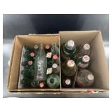 Lot full of vintage Coca Cola bottles including un