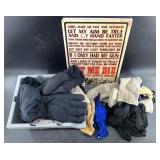 Assorted gloves, mittens and sheet metal signs