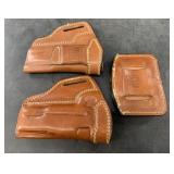 Lot of 3: pair of Kirkpatrick 1911 leather hand gu