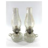 Pair of kerosine lamps with chimneys.