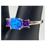 Sterling silver ring with lab opal and purple CZ s