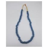 String of blue sand cast beads