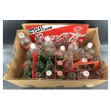 Lot full of assorted vintage Coca Cola bottles, al