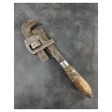 Antique 8inch pipe wrench in working order.